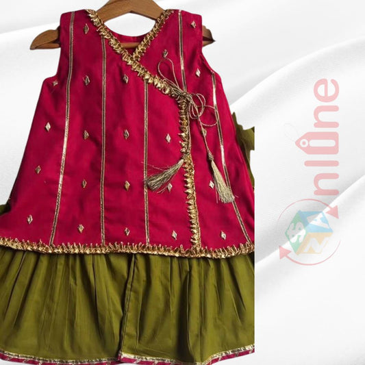 Angrakha style short frock paired with olive green ghrara